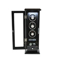 wooden black watch winder case with three watches inside on a white background