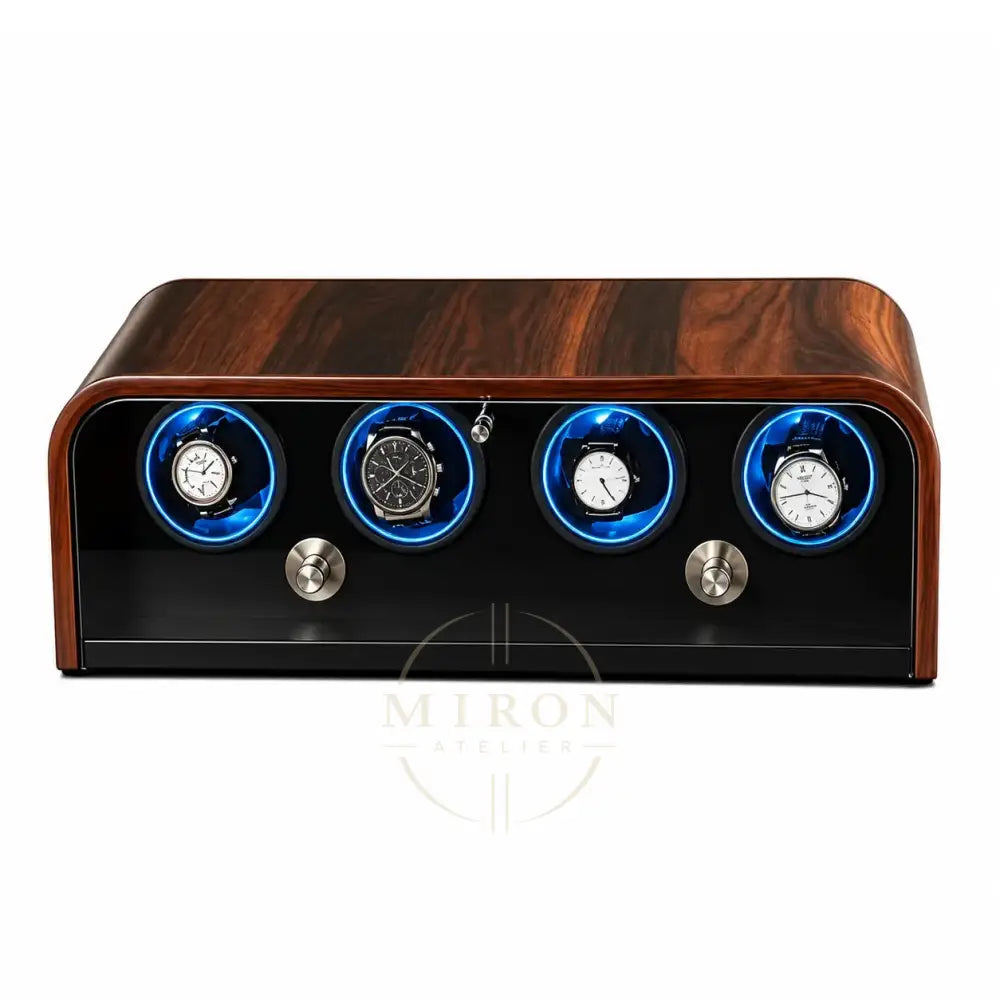 Wooden watch display case with four illuminated watches on a white background