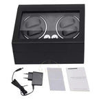 Black watch winder with accessories on a white background