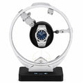 Audemars Piguet Royal Oak on a luxury watch winder stand with a white background