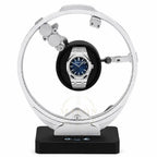 Audemars Piguet Royal Oak on a luxury watch winder stand with a white background