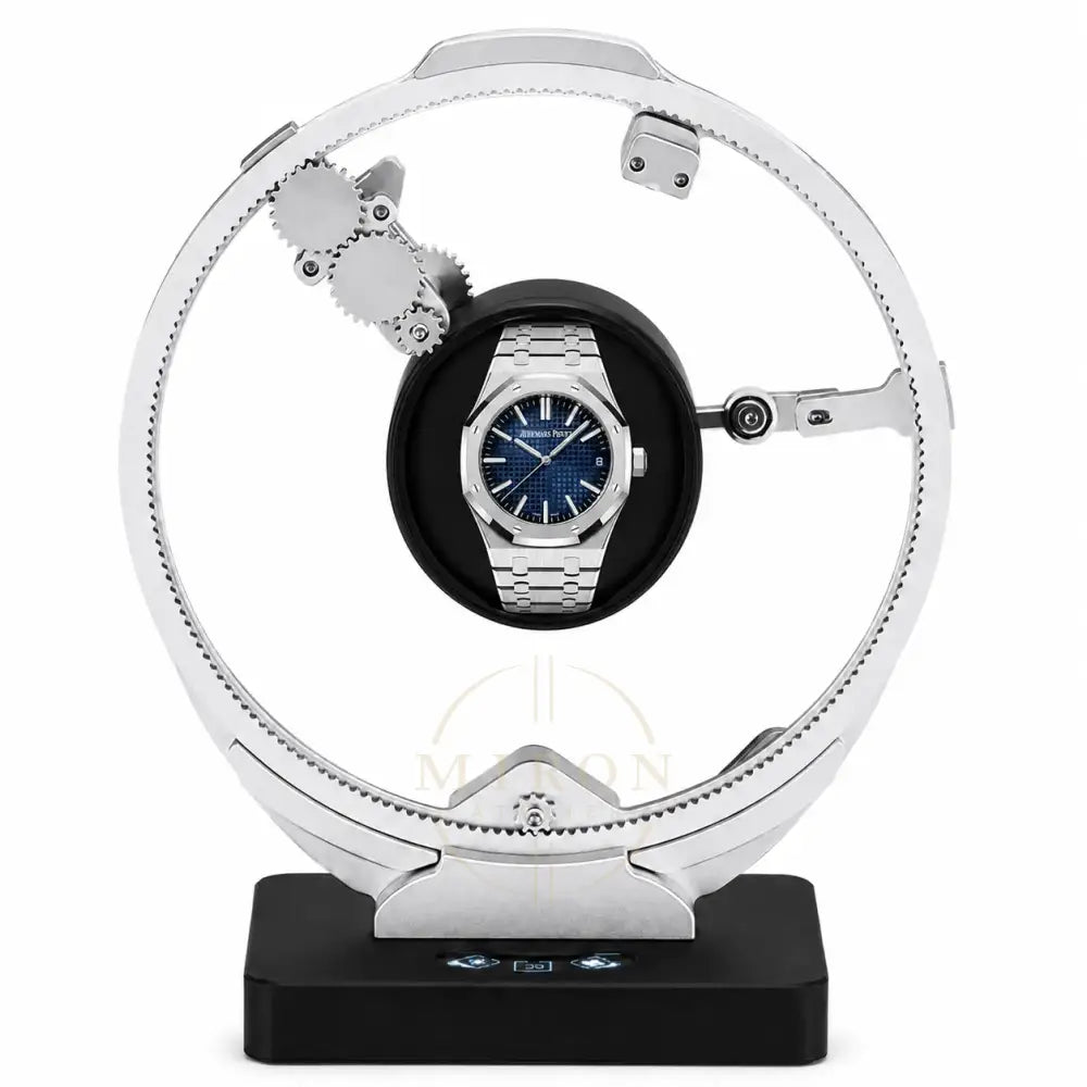 Audemars Piguet Royal Oak on a luxury watch winder stand with a white background