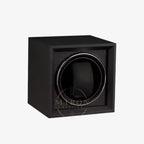 Black watch winder with textured surface on a white background