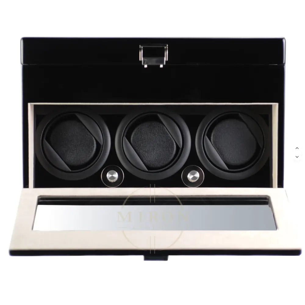 Black watch winder with three compartments on a white background