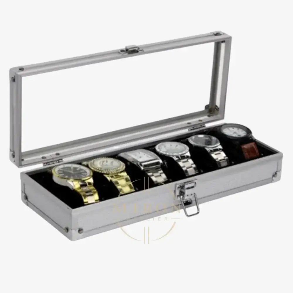 Silver watch box with six luxury watches inside on a white background