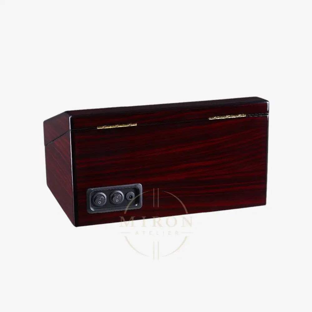 Wooden watch-winder with electronic components backside on a white background