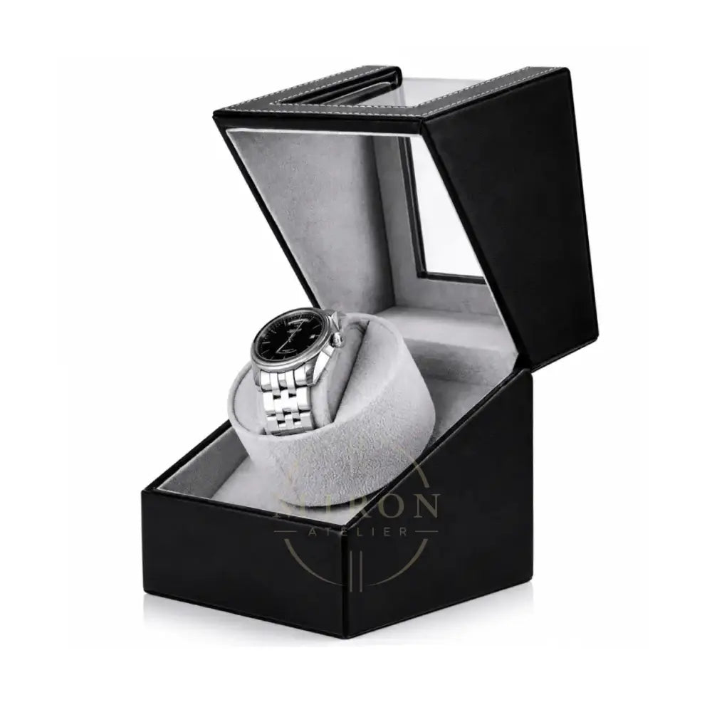 Luxury Watch in a black watch winder box and grey velour on a white background