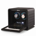 Wristwatch winder with quilted design on a white background