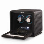 Wristwatch winder with quilted design on a white background