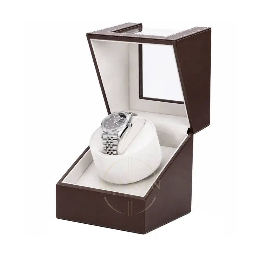 Automatic Watch in a brown and white watch winder box on a white background