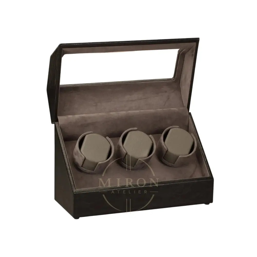 Brown watch box with three compartments on a white background
