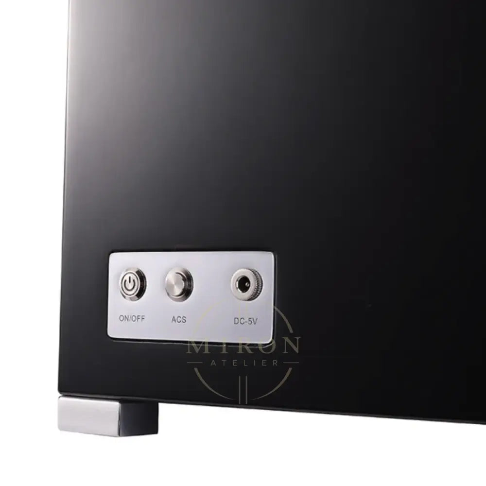Control panel with power, ACS, and DC-5V ports on a black watch winder device.
