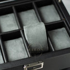 Gray ring on gray felt in a black jewelry box