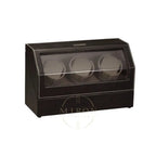 Black watch winder with three watch cases on a white background