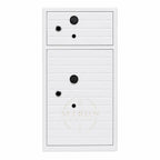 White safe with black circular features on a white background