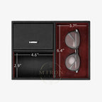 Black leather wallet and sunglasses in a box with measurements of a watch winder ompartment