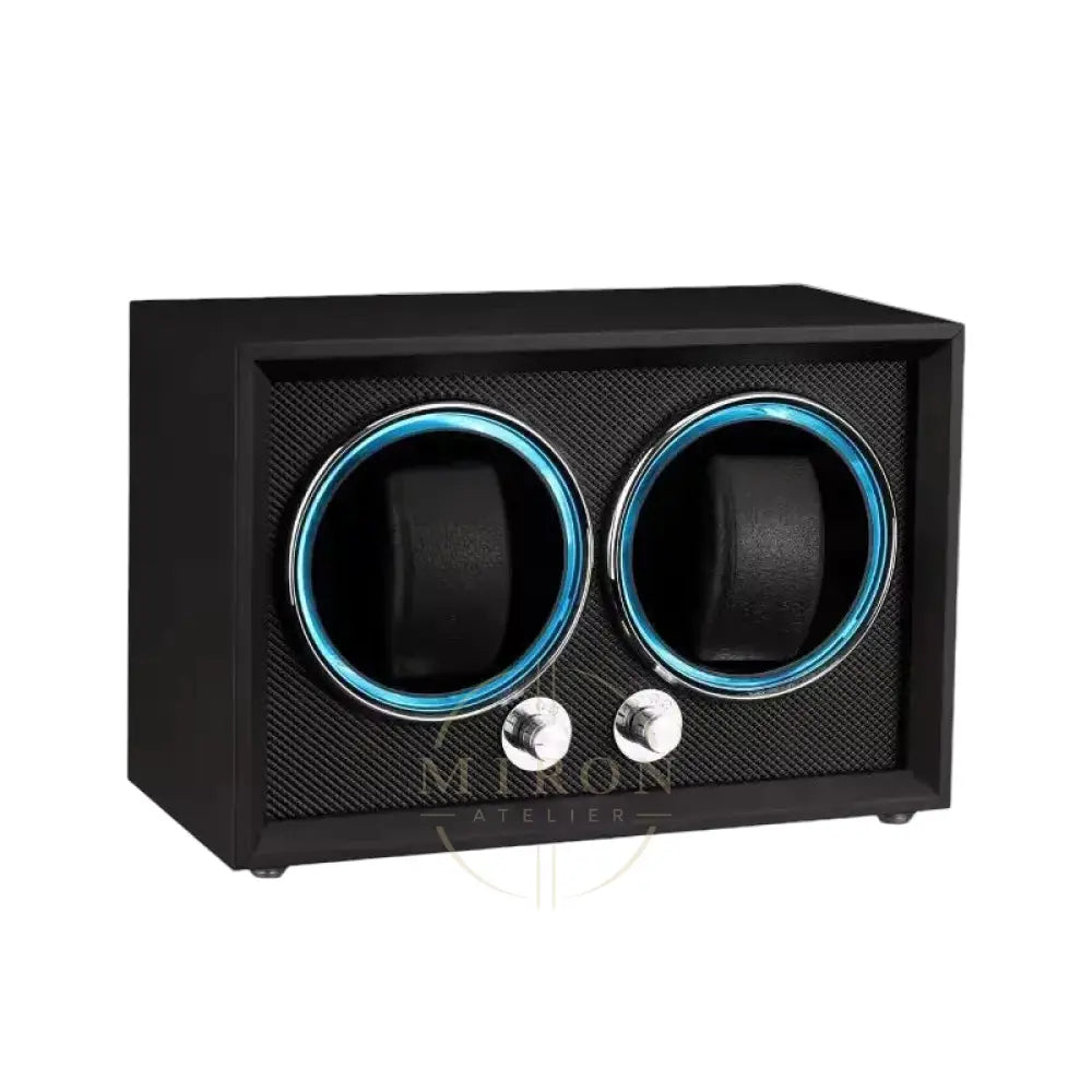 Black watch winder with two rotating compartments on a white background