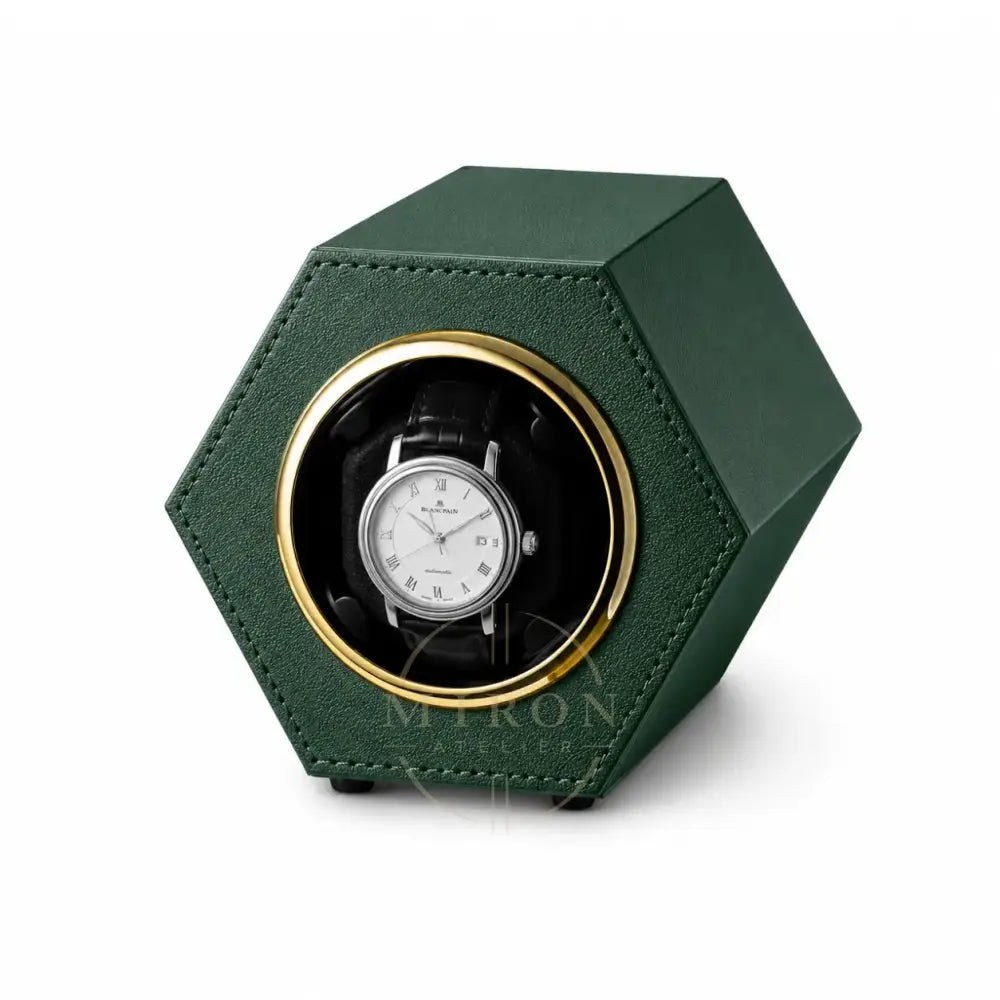 Hexagonal green watch winder with a automatic watch inside