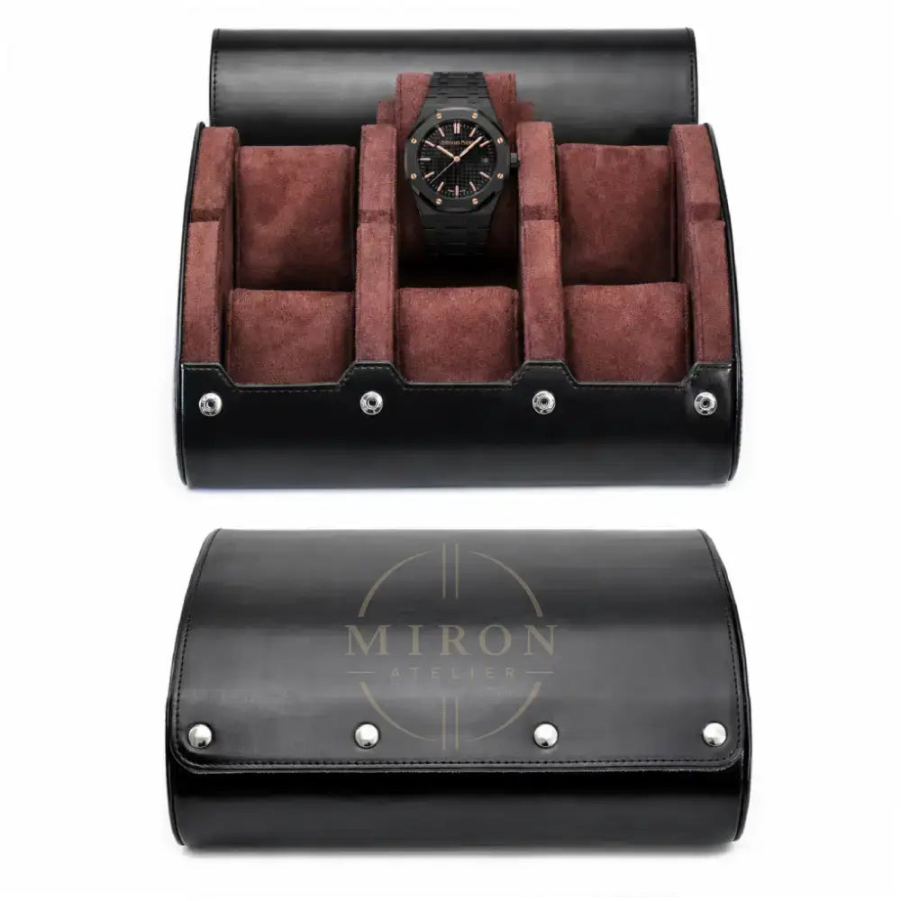 A black leather watch storage roll shown open and closed on a white background. The open case reveals brown suede-like interior compartments, and a Audemars Piguet luxury watch inside.
