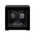 Black watch winder with two luxury watches inside : Patek Philippe and Audemars Piguet.