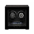 Black watch winder with two luxury watches inside : Patek Philippe and Audemars Piguet.