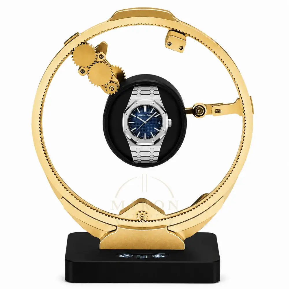 Gold watch display watch winder with a Audemars Piguet watch inside on a white background