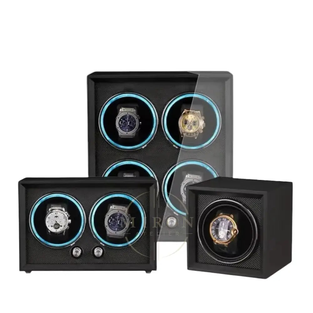 Set of luxury watch winders with watches inside on a white background