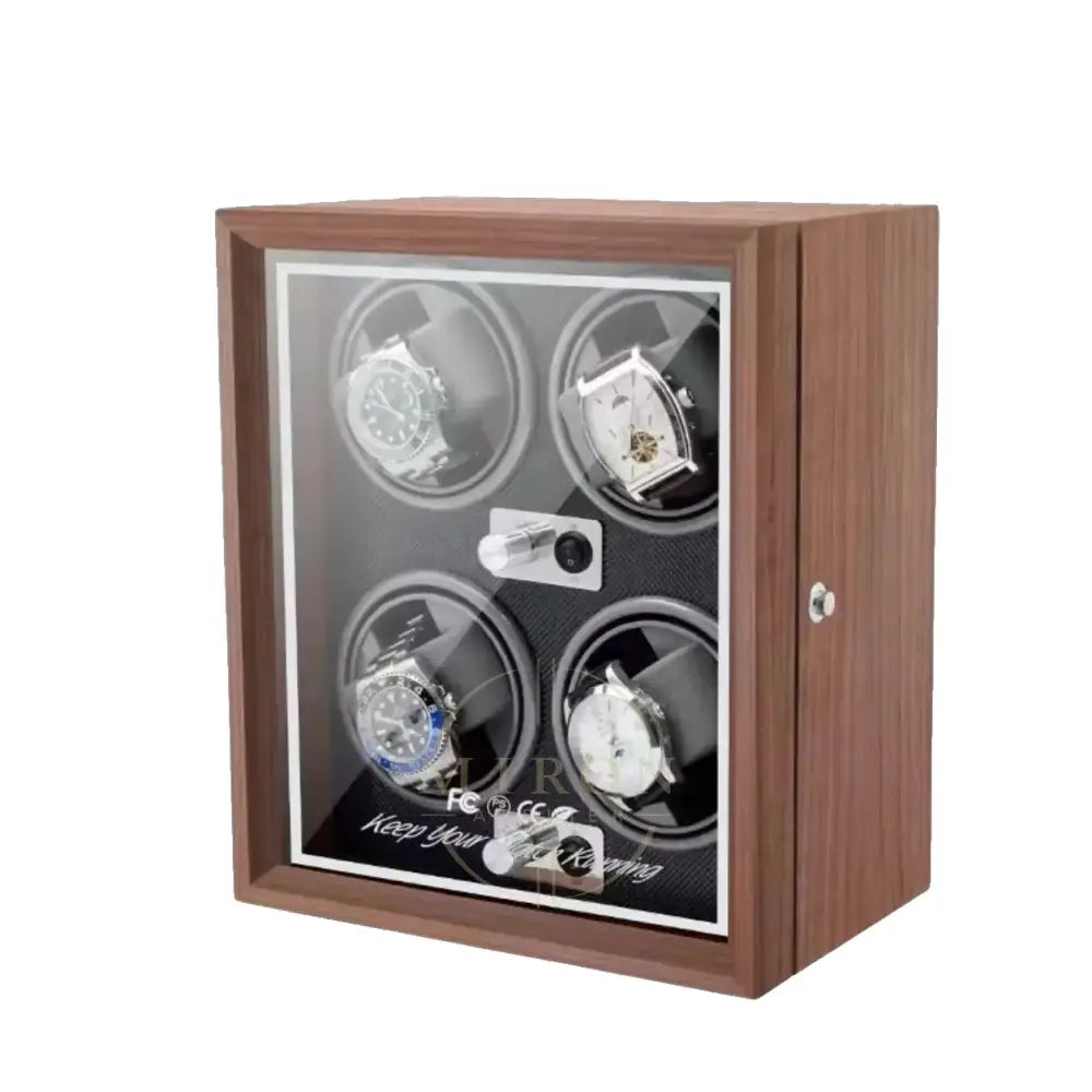 Wooden watch winder with four watches inside on a white background