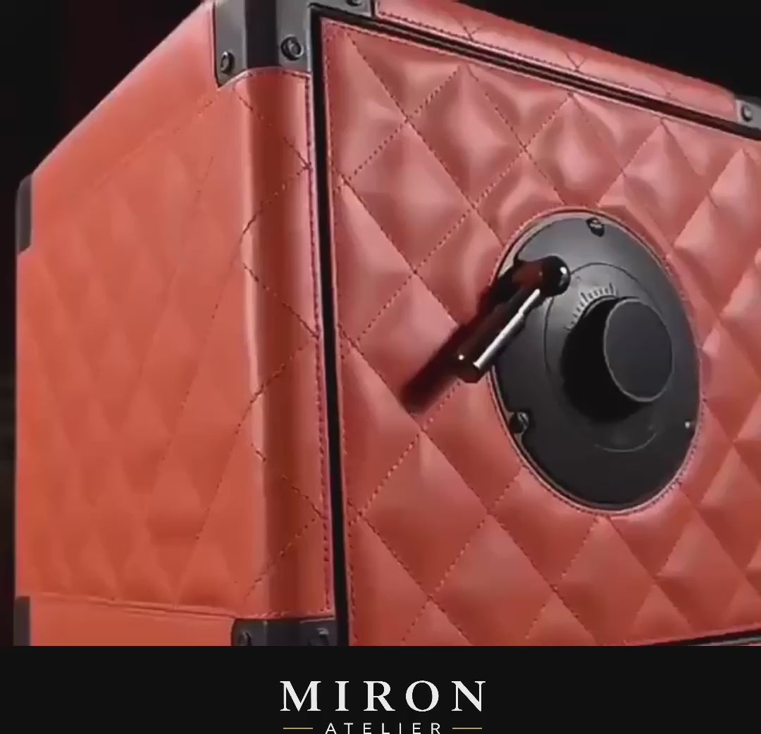 Video of orange watch winder safe. Brand : Miron Atelier