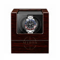 Rolex GMT Master in a wooden vitage watch winder case with a white background