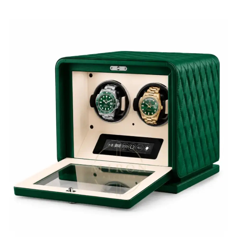 Green watch winder with two rolex inside on a white background