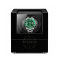 Rolex Watch Winder with a black case on a white background