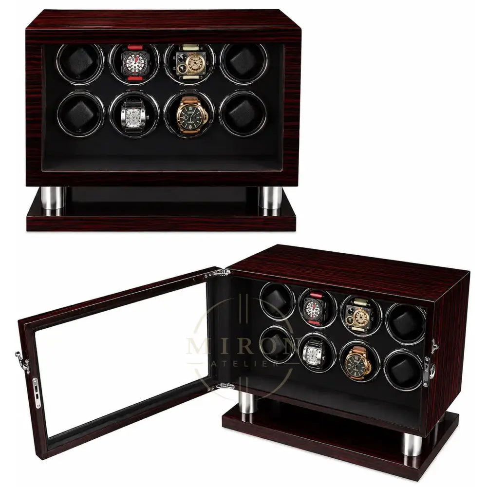 Wooden watch winder with multiple watch cases on a white background