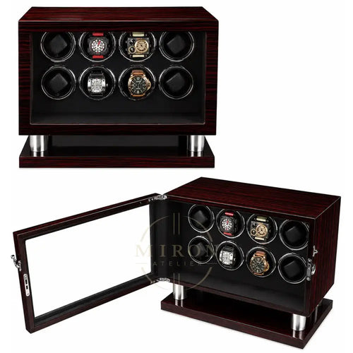 Wooden watch winder with multiple watch cases on a white background