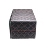 Black quilted leather watch winder side mat with red stitching on a white background