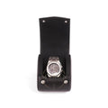 Silver watch in a black leather display case on a white background