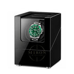 Black watch winder with a Rolex Hulk watch inside on a white background