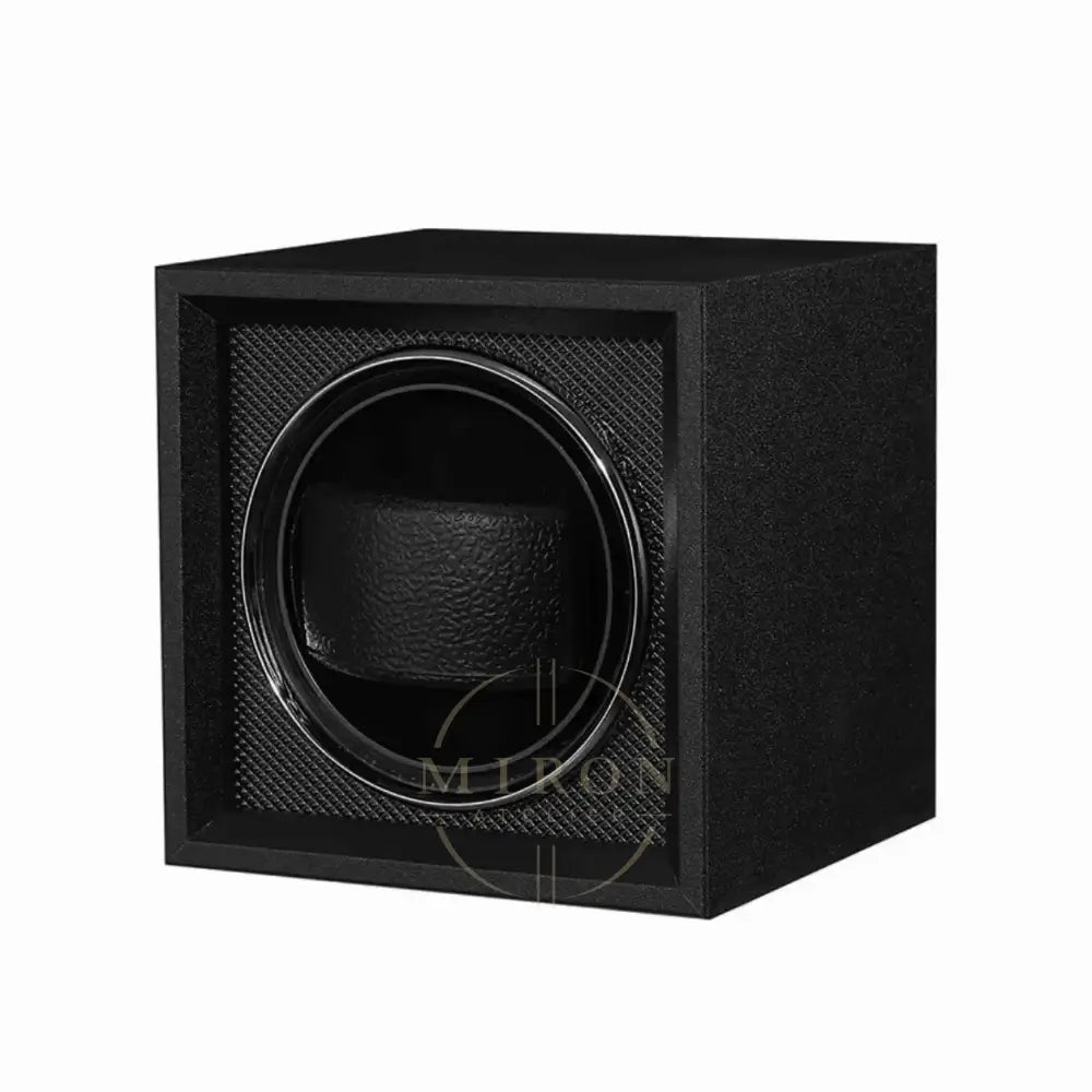 Black watch winder for Tudor and other watches on a white background