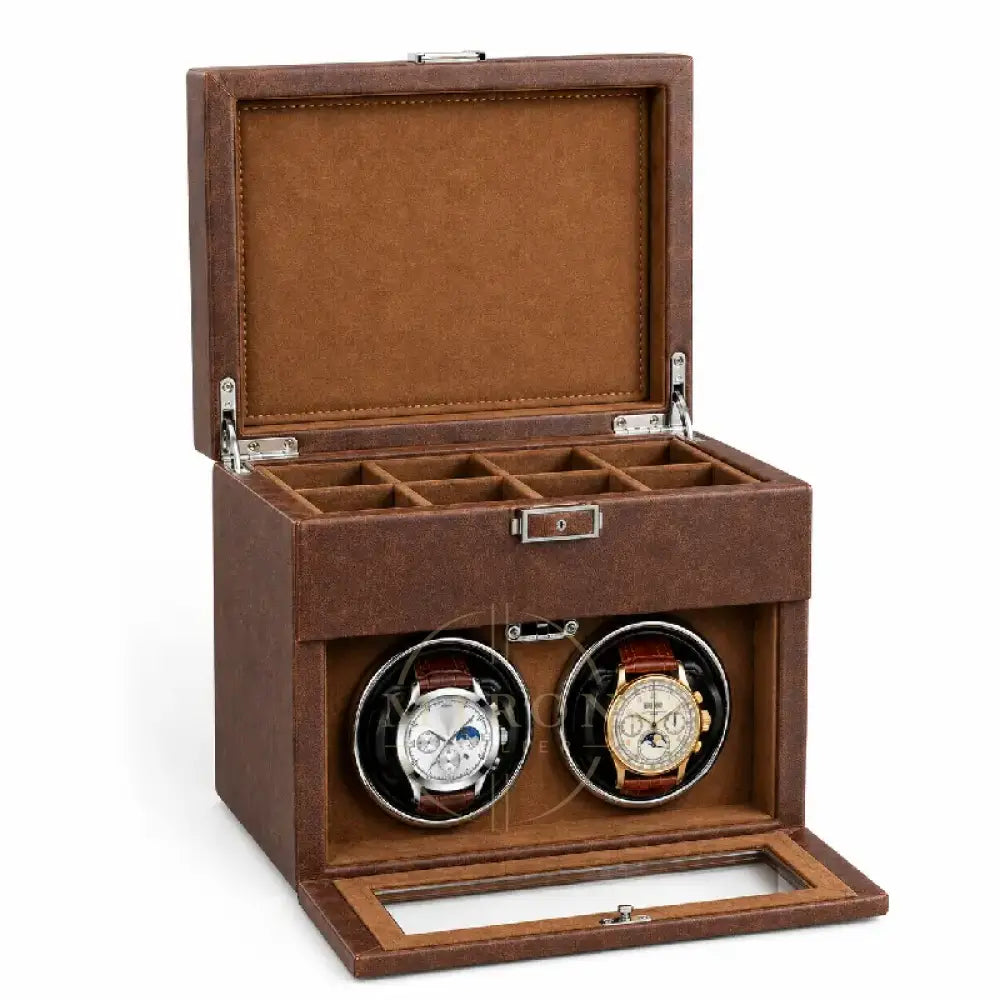 Brown watch winder with two watches inside on a white background
