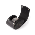 Black leather watch case with a silver luxury watch on a white background