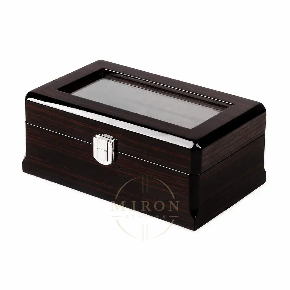 A rectangular dark wood watch box with a glossy finish, a clear glass window on top, and a silver metal latch, shown on a plain white background.