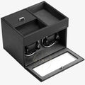 Black watch winder with two rotating watches on a white background