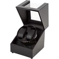 Black watch winder in an open display case on a white background