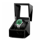 Rolex Watch in a luxury watch winder on a white background