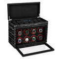 Black watch winder with multiple watches. For luxury watch collector.