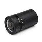 Black crocodile-patterned watch winder roll with a luxury watch inside on a white background