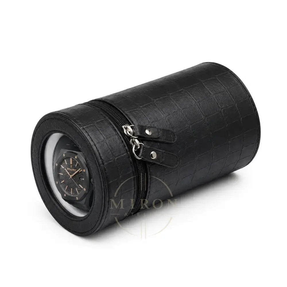 Black crocodile-patterned watch winder roll with a luxury watch inside on a white background