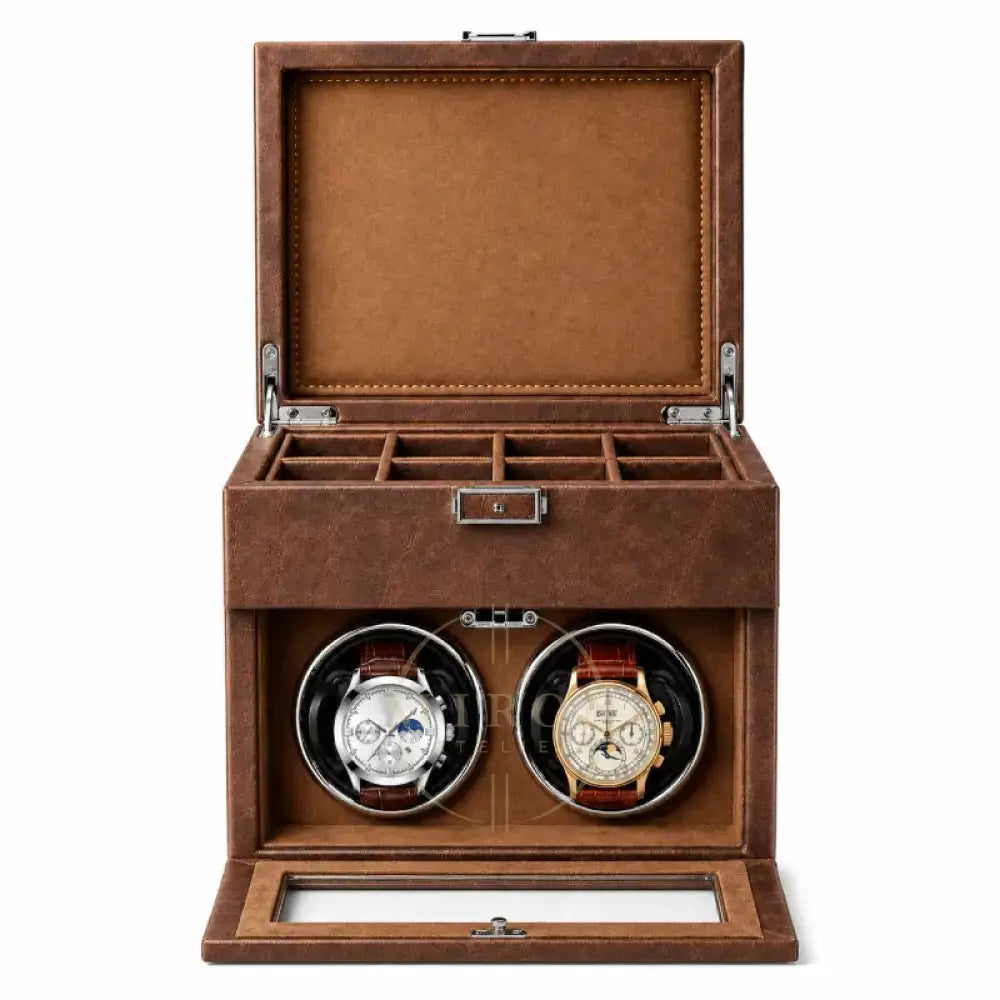 Brown leather watch winder box with two vintage luxury watches inside