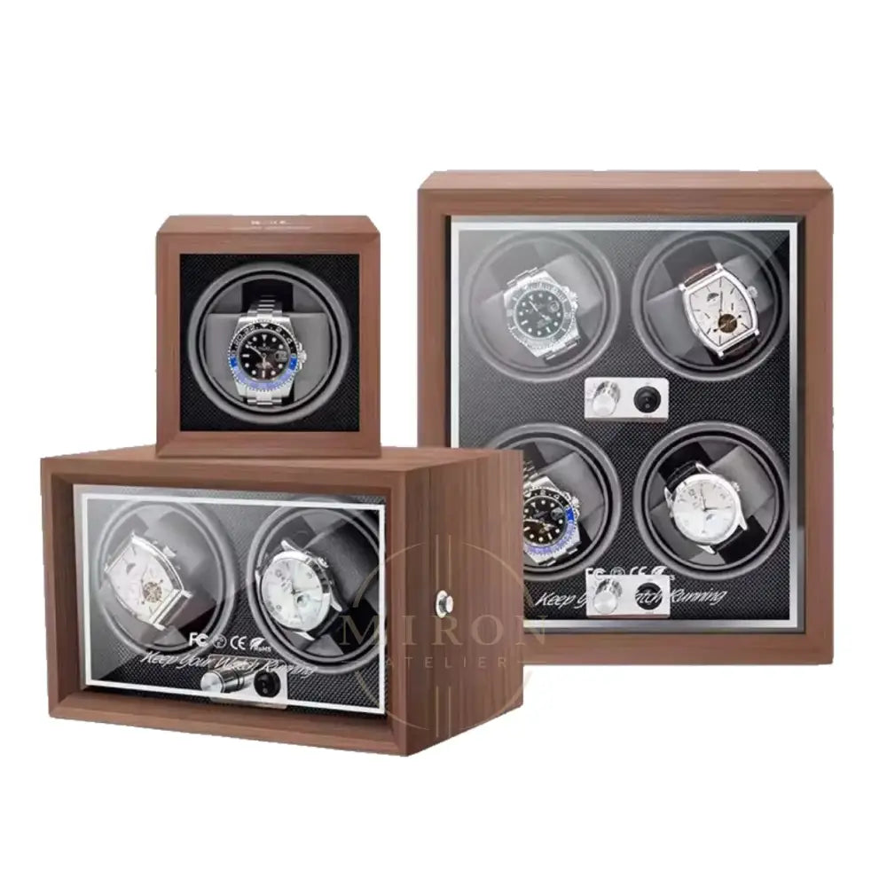 Wooden watch winders boxes with multiple watch faces displayed on a white background