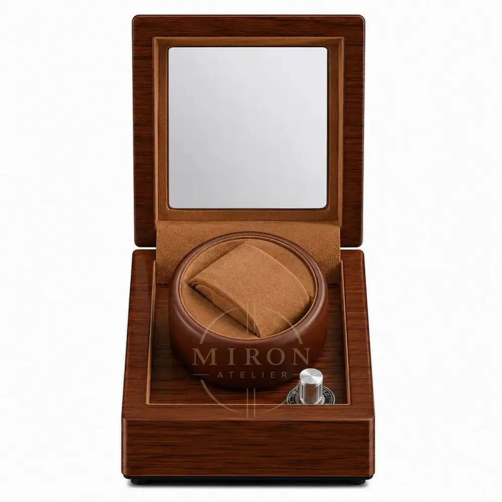 Wooden watch winder box with no watch inside on a white background